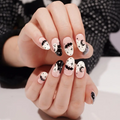 Haunted Glow semi-cured gel nail strips by MANITIME